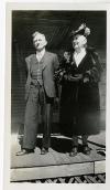 Unidentified man and woman in fur coat