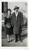 Unidentified man and woman in formal clothes