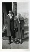 Unidentified older man and woman in formal clothes