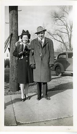 Unidentified man and woman in formal clothes