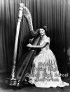 Shirley with harp, junior high [Shirley at harp with poodle cut 001.jpg]